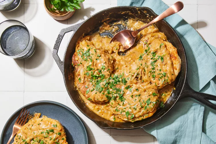 Smothered Pork Chops Should Be Your Go-To Weeknight Dinner