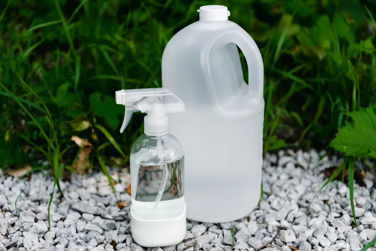 How to Make a Vinegar Weed Killer to Use on Walkways and Driveways