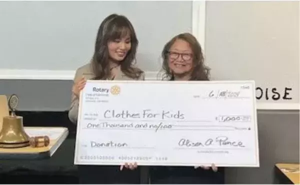 Rotary Club of Edmonds presents check to Clothes for Kids