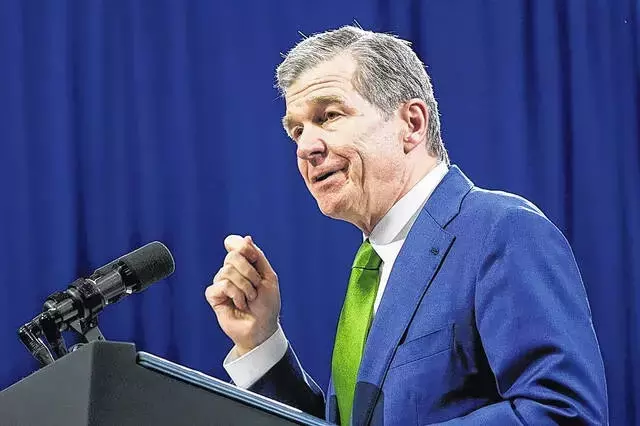 North Carolina Gov. Roy Cooper vetoes masks bill over campaign finance