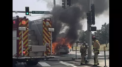 2 injured after car crashes, bursts into flames west of Denver