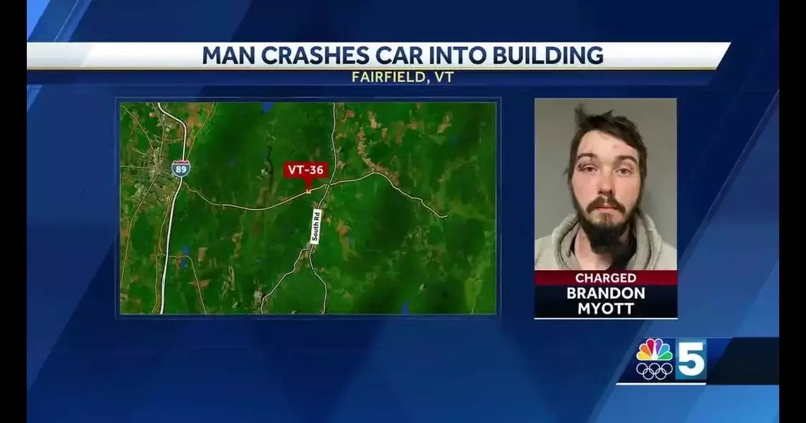 Man crashes car into building, and flees on foot, all with a suspended license