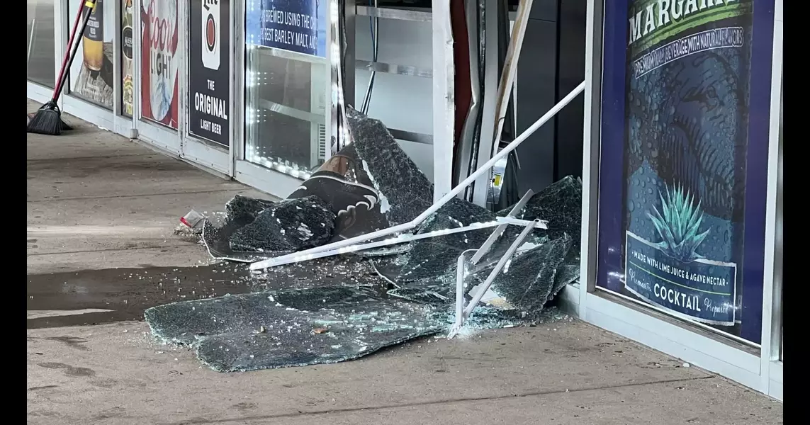 Car crashes into Kentwood liquor store