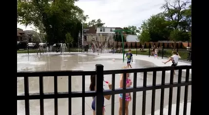 Kids wasted no time soaking in the fun at the new splash pad in Elmwood Park