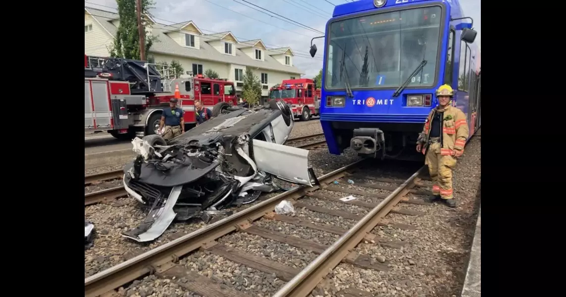 Car flips after MAX collision in Portland; driver sustains serious injuries