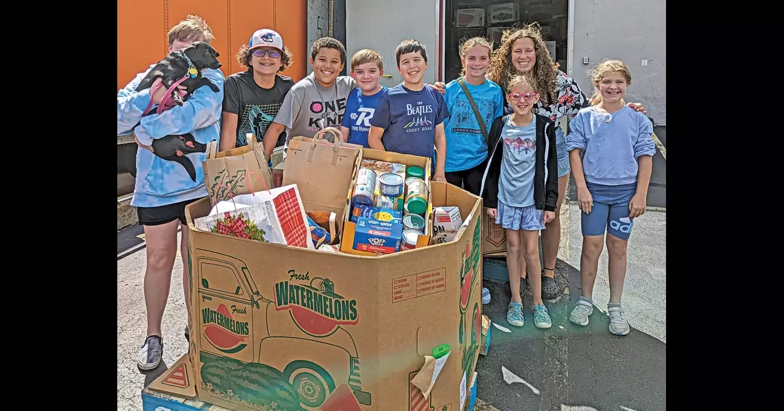 Area children collecting food donations for “Christmas in July”