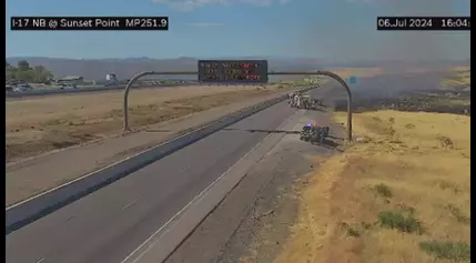 Interstate 17 closed for car fire turned brush fire at Sunset Point