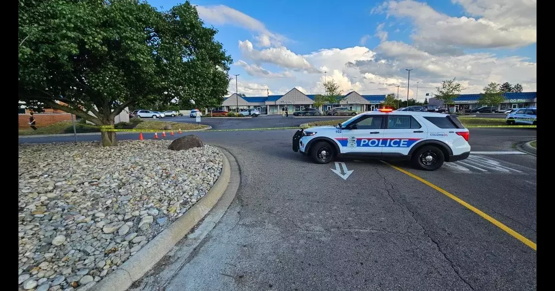 One hospitalized, another in custody after pedestrian hit by car near Walmart