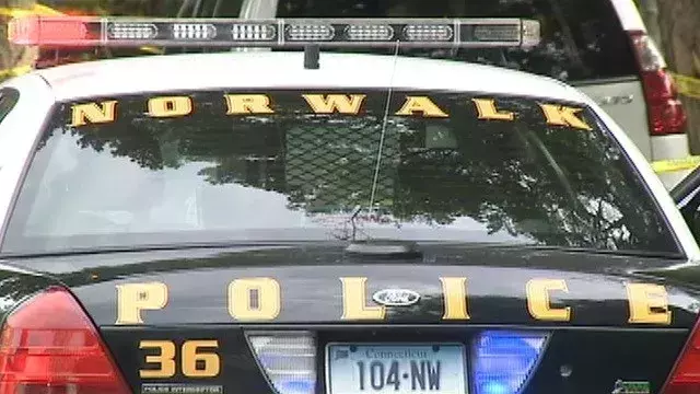 A woman is dead after being struck by a car in Norwalk