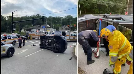 1 rescued after becoming pinned inside overturned car on Banksville Road