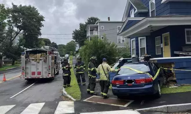 Significant damage after car crashes into Auburn, Maine home