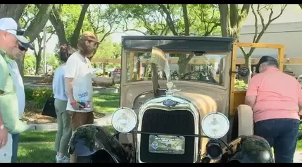 Car owners embrace wood-bodied theme at 52nd annual Sloan Museum Auto Fair