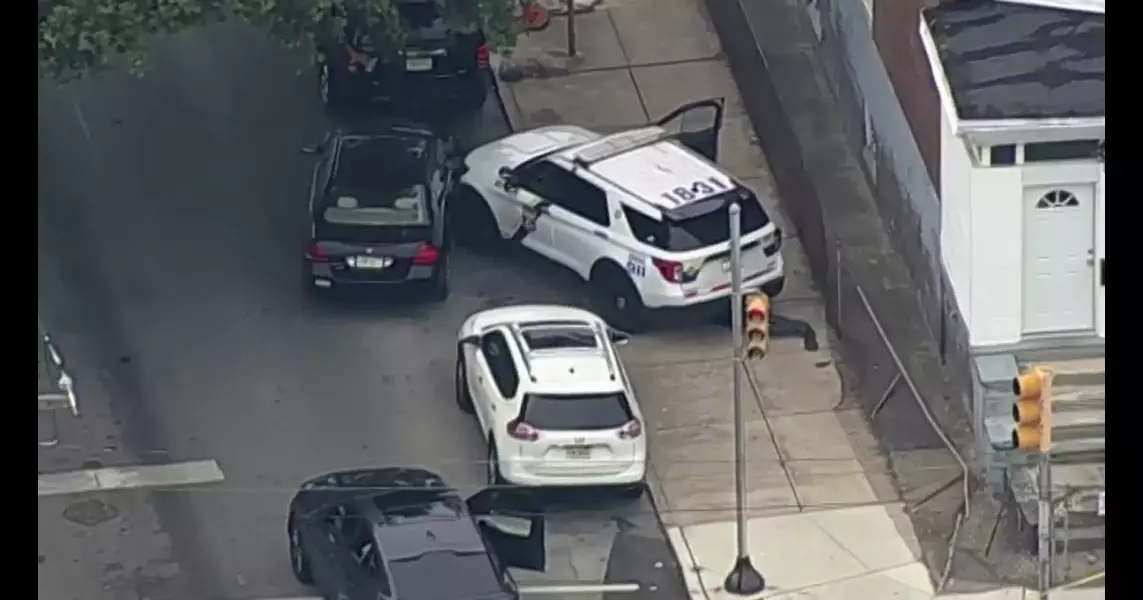 Police SUV with lights, sirens on collides with car in West Philadelphia, police say