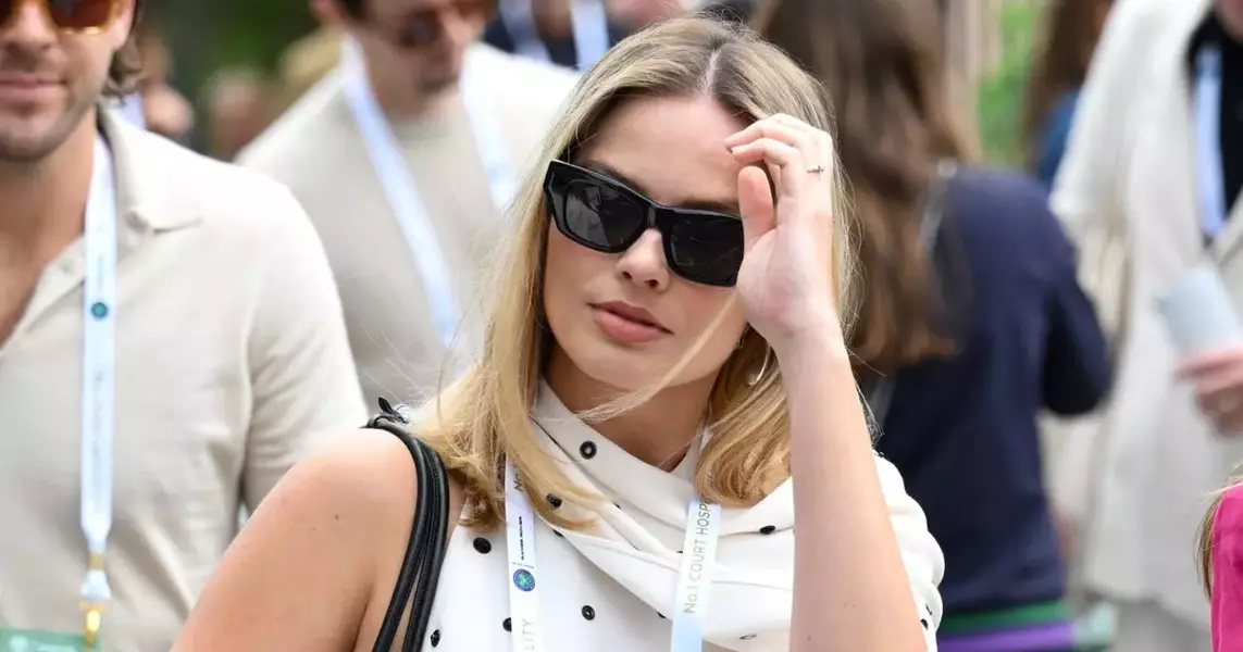 Margot Robbie Debuted Her Baby Bump In A Unique White Dress At Wimbledon