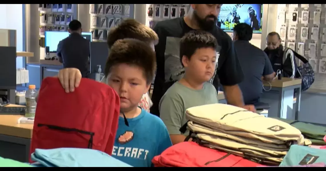 Wireless World hosts 7th annual backpack giveaway