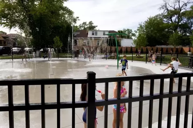 Kids wasted no time soaking in the fun at the new splash pad in Elmwood Park