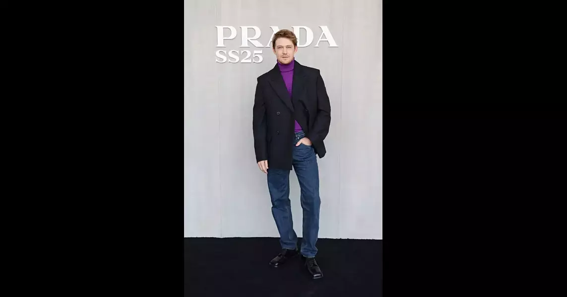 Joe Alwyn Is Effortlessly Cool in Purple at Prada Menswear Fashion Show