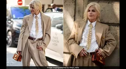 Instead Of A Regular Necktie, Selma Blair Wore A Blonde Hair Braid With Her Beige Pantsuit