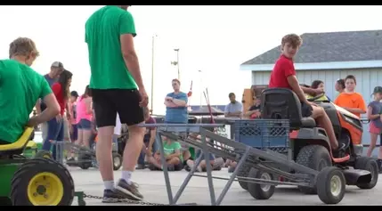 Kids participate in the tractor pull at the East Pottawattamie County Fair