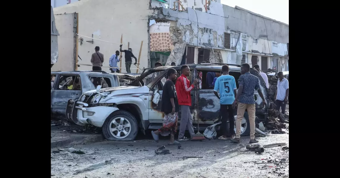 Car bomb explodes at busy cafe in the Somali capital, killing nine