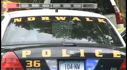 A woman is dead after being struck by a car in Norwalk