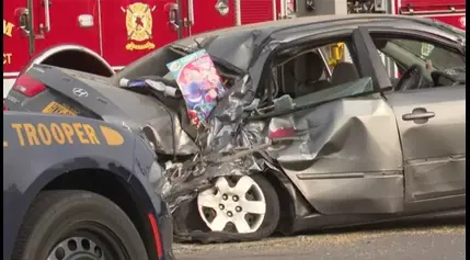 Car & harvester collide near Calcium