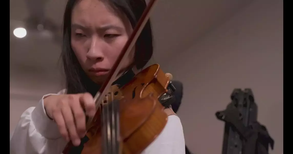 Disabled North Texas violinist uses music to transcend her ailment