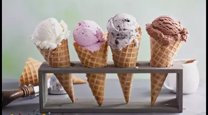 Kids recite the Pledge of Allegiance for a free scoop of their favorite ice cream flavor