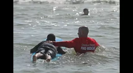 First responders help kids ‘Hang Ten’ at surfing event in Daytona