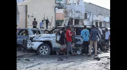 Car bomb explodes at busy cafe in the Somali capital, killing nine