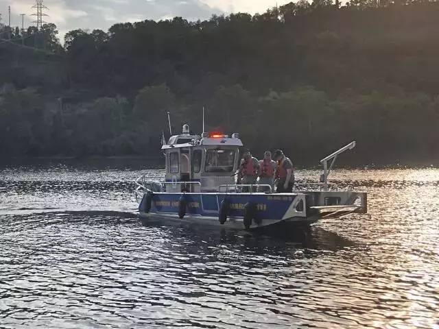 Emergency responders investigate car in Allegheny River in Oakmont