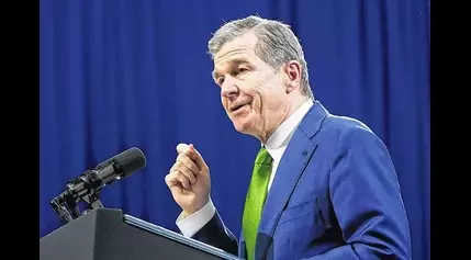 North Carolina Gov. Roy Cooper vetoes masks bill over campaign finance