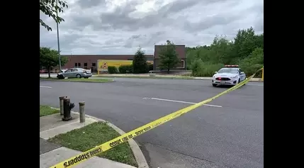 Car smashes into pole at Staten Island shopping center; 2 injured, 1 critically