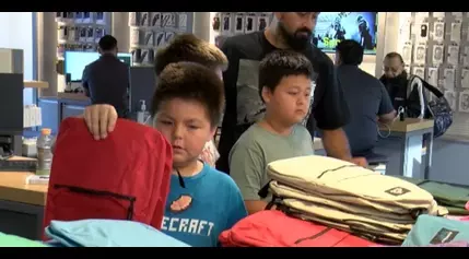 Wireless World hosts 7th annual backpack giveaway