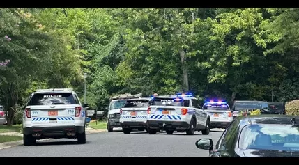 Heavy police presence in SW CLT after car chase ends at Olympic High School