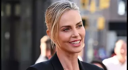 Charlize Theron says her kids are ‘so embarrassed’ by her, joking ‘they’re a–holes, but they’re really nice’