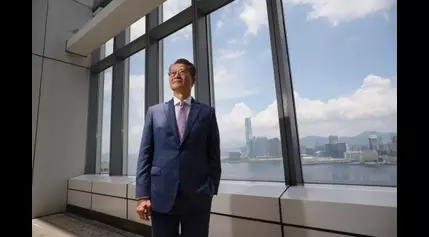 Hong Kong finance chief urges Cathay to raise service quality to boost status