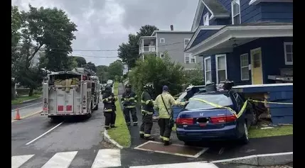 Significant damage after car crashes into Auburn, Maine home