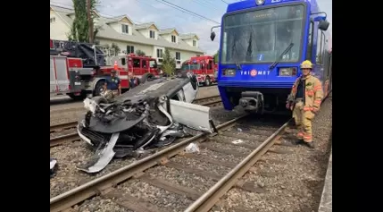 Car flips after MAX collision in Portland; driver sustains serious injuries