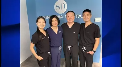 Father and 2 kids leading the way at Fresno dental office