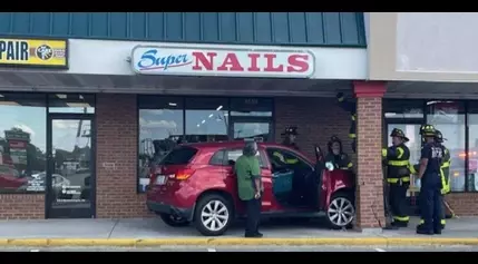 Car crashes into brick column in front of nail salon