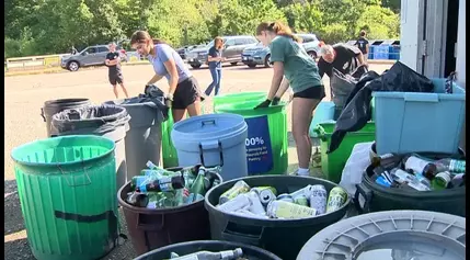 Group raising money for Needham food pantry marks milestone with 3 million cans