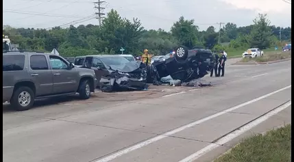 Section of Scott Boulevard in Columbia closed after crash, car seen flipped in roadway