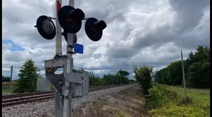 Car struck by train in northern Ohio after attempting to cross railroad tracks while gates were lowered