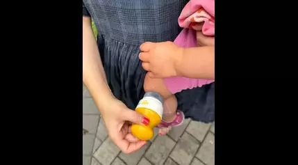 This Applicator Makes It Easy to Put Sunscreen on a Toddler