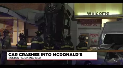 Car flips, crashes into McDonalds on Boston Road