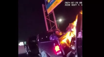 WATCH: Lewisville Police rescue man who was trapped in fiery car