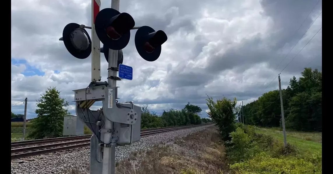 Car struck by train in northern Ohio after attempting to cross railroad tracks while gates were lowered