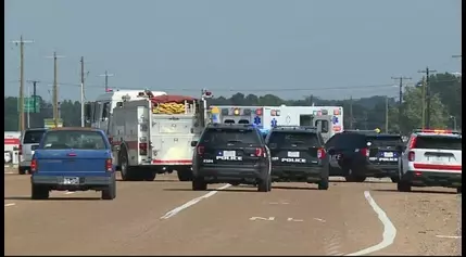 Wreck involving vehicle and police car