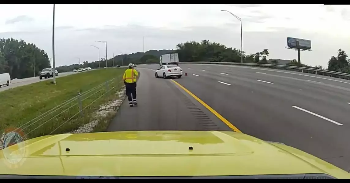 VIDEO: TDOT makes plea to Tennessee drivers after car almost hits worker